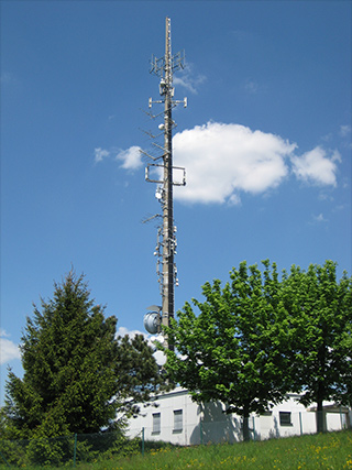 [Photo: radio-waves broadcast mast]