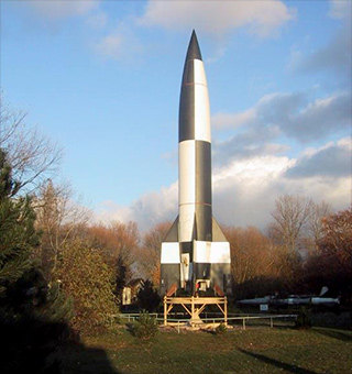 [Photo: replica of V2 rocket]